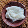 Organic undyed unbleached carded wool
